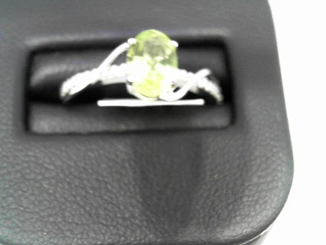 Ladies rings cog charm -10K WG AND PERIDOT RING W/DIAM