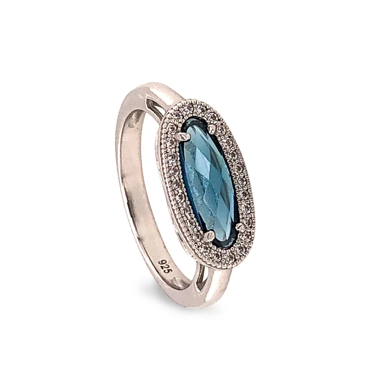 Ladies rings art glow -Platinum Finish Sterling Silver Micropave Oblong Ring with Simulated London Blue Topaz and Simulated Diamonds