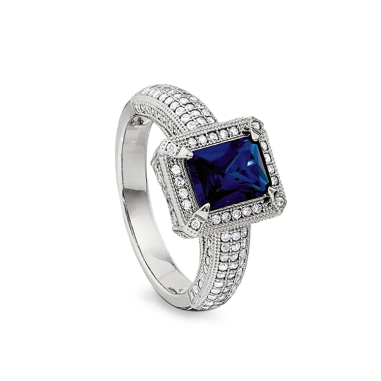 Ladies rings mold radiance -Platinum Finish Sterling Silver Micropave Emerald Cut Synthetic Blue Sapphire Ring with Simulated Diamonds