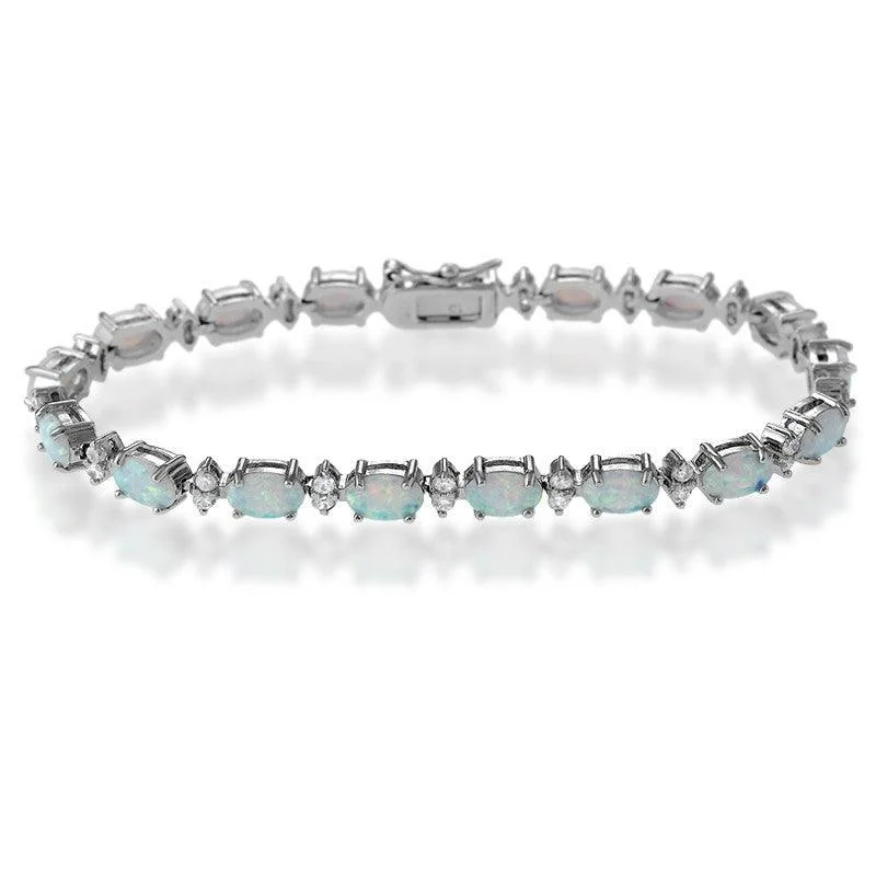 ladies bracelets edwardian-Sterling Silver Oval White Opal & Marquise Shape CZ Bracelet