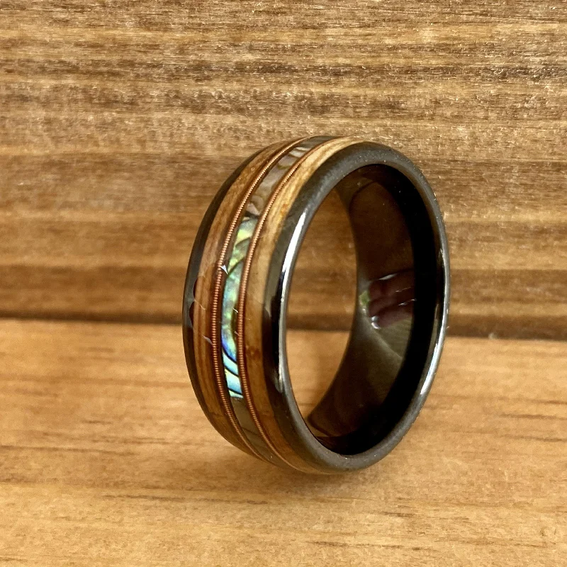 Ladies rings aquamarine glow -“The Rockstar”  Reclaimed Bourbon Whiskey Barrel Black Ceramic Ring With Guitar String