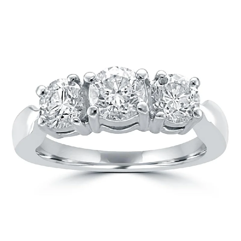 Ladies rings mindful charm -Platinum .59CTW 3 Stone Diamond Ring