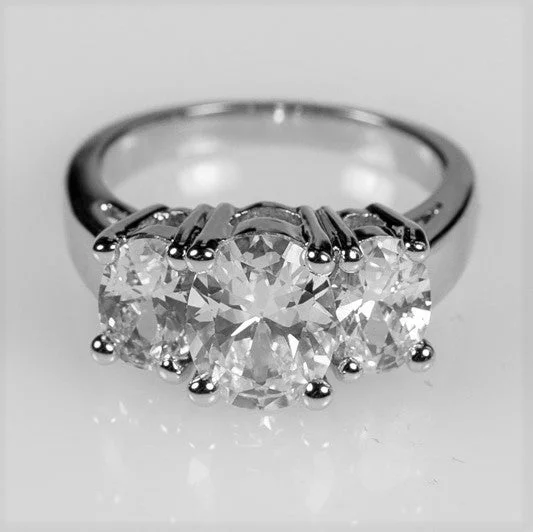 Ladies engagement rings helm shine -Jucinda Three Stone  Oval Cut Engagement Ring | 4 Carat | Cubic Zirconia